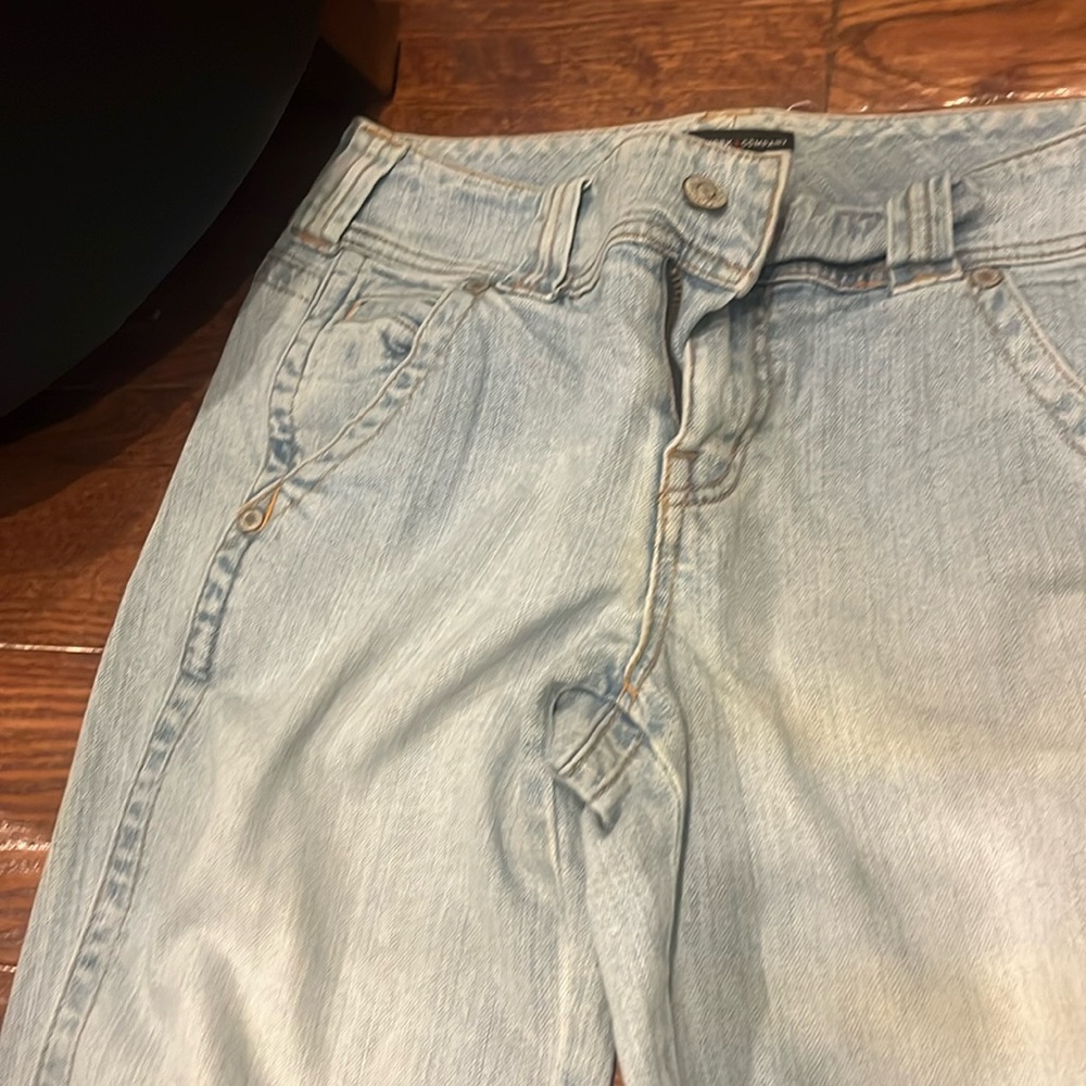 Light wash wider legged jeans